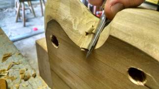 Shape the underside with a drawknife and whatever else fits the bill.